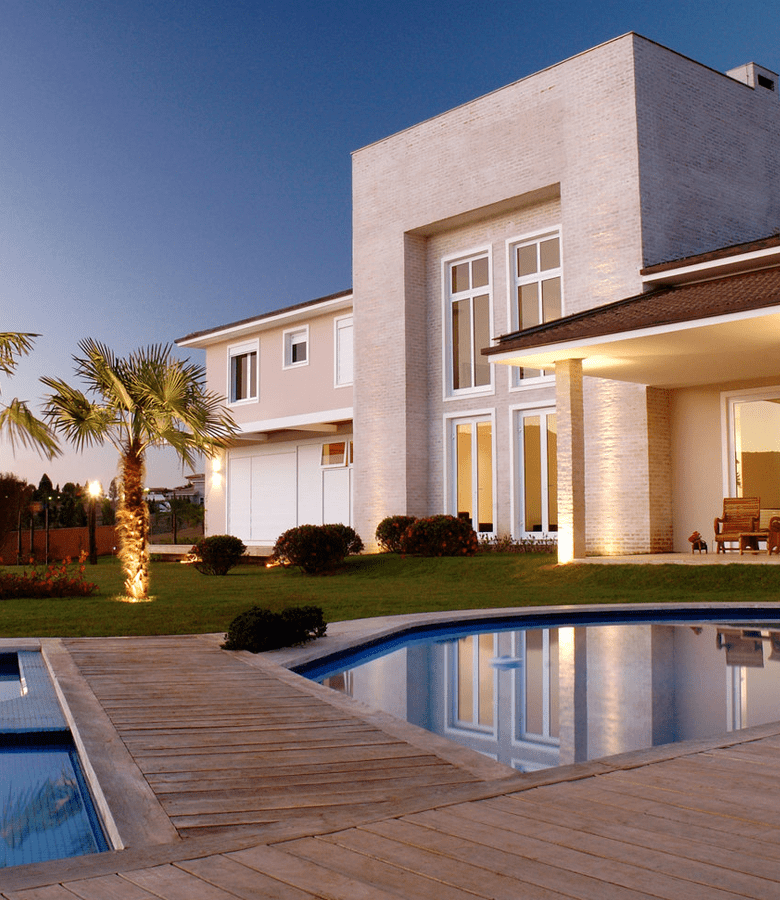 Modern house with pool at dusk